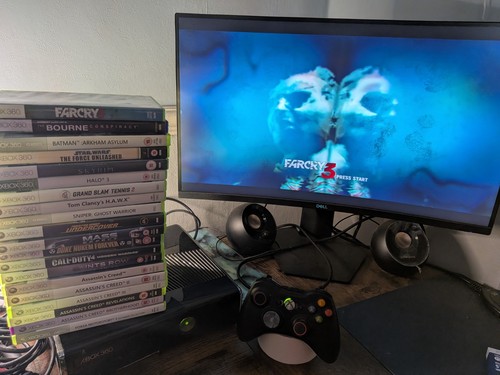 Xbox 360 slim - 250gb, shiny